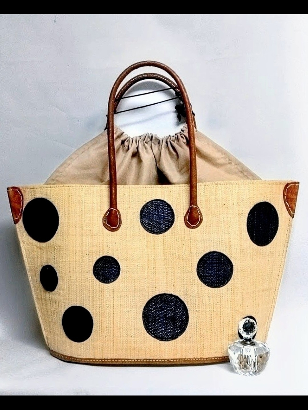 Stylish Beige Polka Dot Straw Tote Bag with Black Accents